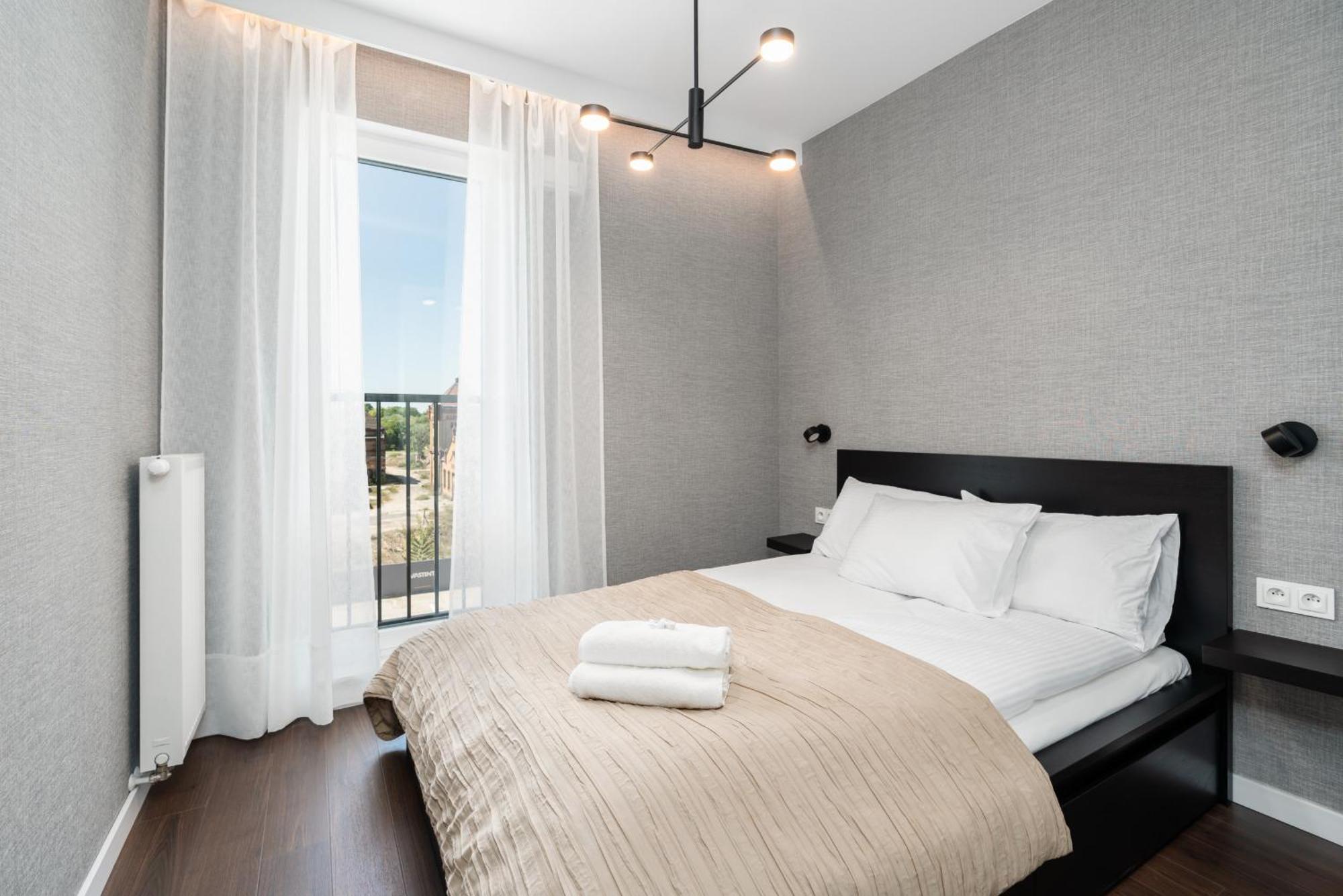 Stylish & Comfy Garbary Apartments With Parking By Noclegi Renters Poznan Bagian luar foto
